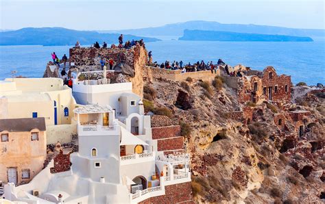 Influencers Sunset Video From Santorini Shows Maskless Crowds