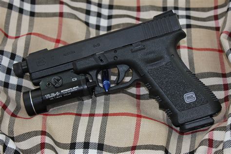 Glock 17 Glock 17 9mm Pistol With Streamlight Tlr 1 Flashl Flickr