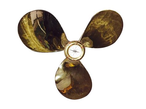 Brass ship propeller freshly polished with brass compass fitt - 187938