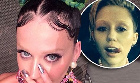 Katy Perry Takes Cues From Miley Cyrus As She Joins In With The Bizarre