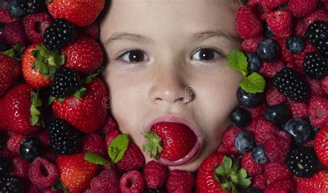 Kids Face With Fresh Berries Fruits Assorted Mix Of Berries Strawberry