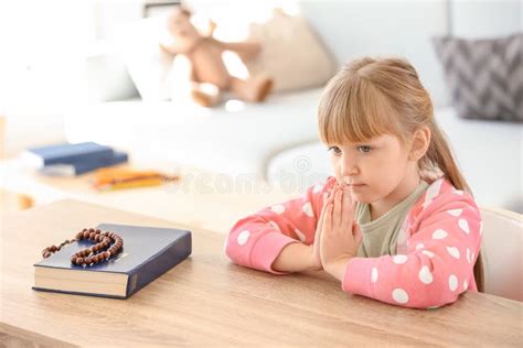 Little Girl Praying At Home Stock Photo Image Of Faith Bible 151270842