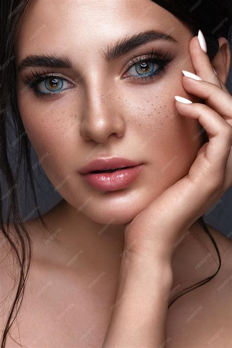 Premium Photo Beautiful Girl With Bright Fashionable Makeup Freckles And Blue Eyes Beauty Face