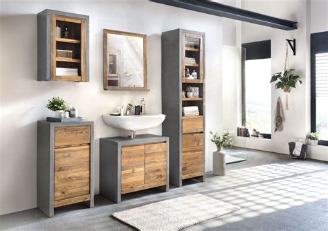 A Bathroom With A Sink And Wooden Cabinets