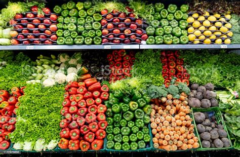 Delicious Fresh Vegetables And Fruits At The Refrigerated Section Of A