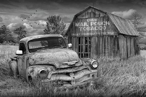 Black And White Of Rusted Chevy Pickup Truck In A Rural Landscape By A