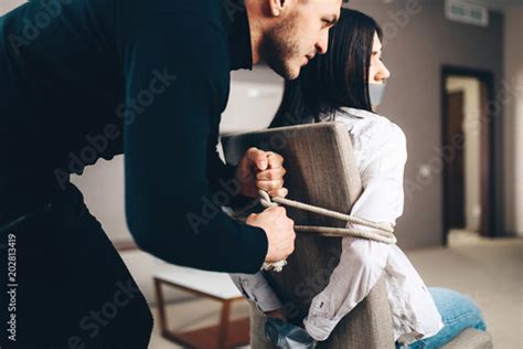 Robber Maniac Tied Female Victim To A Chair Stock Photo And Royalty Free Images On Fotolia Com