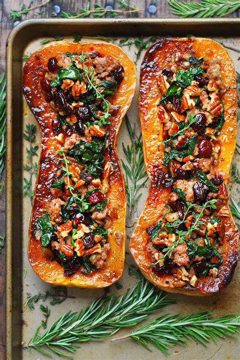 Sausage Stuffed Butternut Squash With Spinach Pecans And Cranberries
