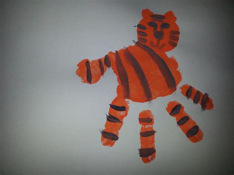 Handprint Tiger Preschool Handprint Crafts Pinterest Footprints