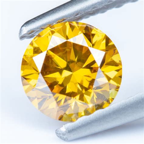 Diamant 052 Ct Naturel Fancy Vivid Orange Jaune Si2 Catawiki