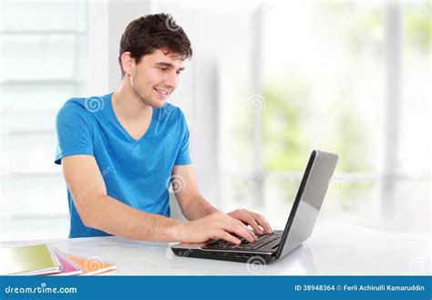 College Student Using His Laptop Stock Photo Image Of Classroom