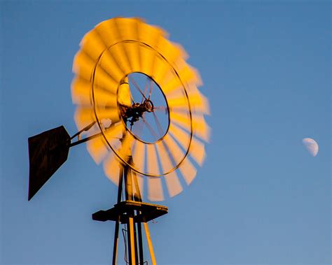 Sun On Windmill With The Moon In Blue Sky Fine Art Photography Print