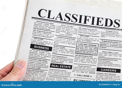 classified ad stock image image of holding newspaper 29369073