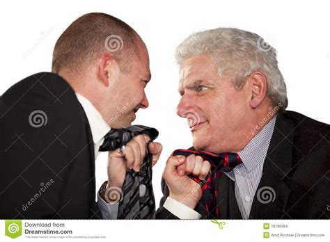 Hombres De Negocios Enojados Que Rasgan En Sus Lazos Foto De Archivo