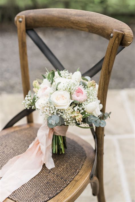 Vivid® posie holders are available in several. Ivory and blush pink bridal bouquet with trailing silk ...