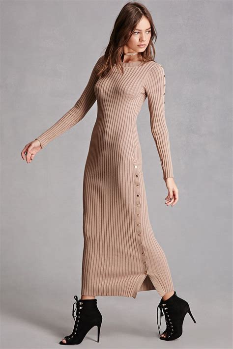 A Heavyweight Ribbed Knit Maxi Dress Featuring Long Sleeves With Snap Buttons Down The Side A