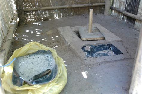 Inside A Dry Latrine And Ashes Nearby For Reducing Bad Smell Well