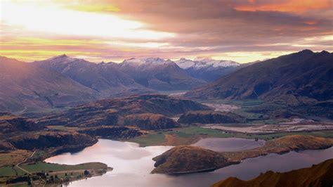 Sunset Over Lake Wanaka From Mount Roy Mount Aspiring In The Distance