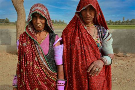 Indian Rajasthani Women Wearing Traditional Colourful Clothing And