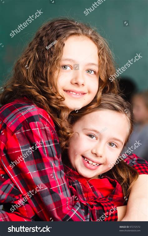 Two Little Sisters Hugging Stock Photo 97272572 Shutterstock