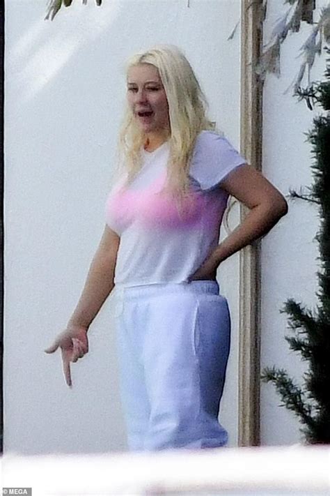 christina aguilera shows off her curves in black swimsuit for valentine s day in miami daily