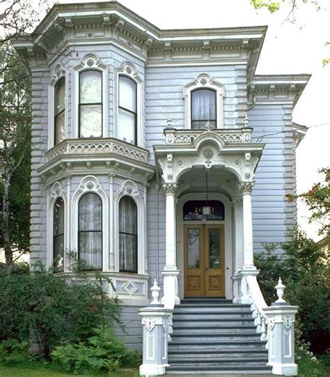 French 1800s Victorian Style Home With Full Roof Ledge And Porch