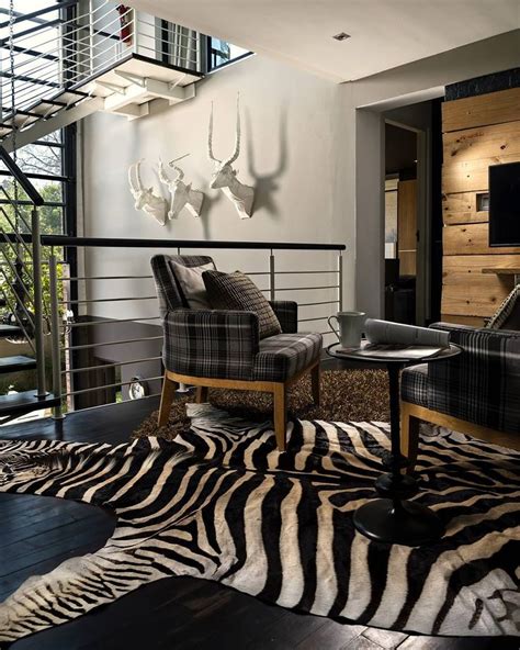 zebra skin rug   add class   interiors zebra decor