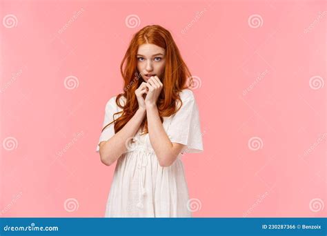 Timid Kawaii Redhead European Girl In White Dress Looking Shy And Cute Blushing Looking From