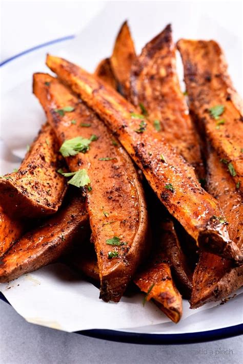 Salt, rosemary leaves, olive oil, potatoes, chopped garlic, pepper. Spicy Roasted Sweet Potato Wedges Recipe - Add a Pinch