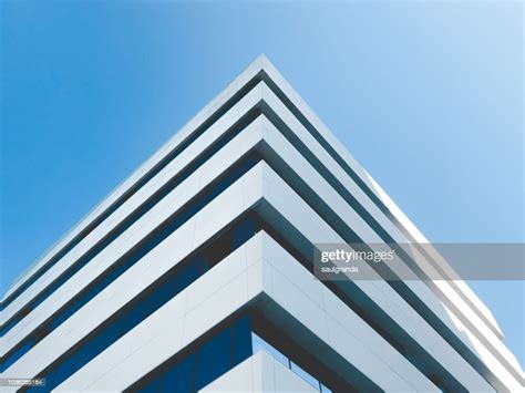 Low Angle View Of Building Corner Against Clear Blue Sky High-Res Stock ...