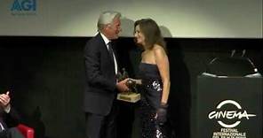 Debra Winger presents Richard Gere with an award at the Rome Film Festival (2011)