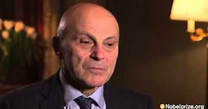 Eugene Fama explains his work to young students