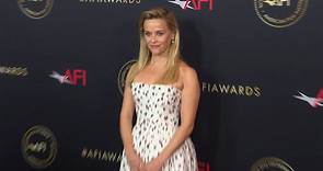 Reese Witherspoon proudly poses at the 2024 AFI Awards Luncheon