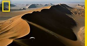 Paragliding Above Extreme Desert Sands | National Geographic