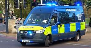 Metropolitan Police + City Police van convoys through London