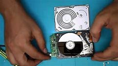 Hard disk drive components under pressure