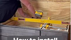 How to install cabinets. Part 3 of our cabinet installation training. Base cabinets need to be level! #thehomebuildingshow , #thehomebuildingandremodelingshow , #contractor , #contractortraining , #contractorlife , #construction , #constructiontraining , #constructionlife , #remodel , #remodeling , #homeremodeling , #diy , #homebuild, #howto , #customhome, #kerbyhomes, #kerbycustom , #kerbyinteriordesign, www.thehomebuildingshow.com | The Home Building and Remodeling Show