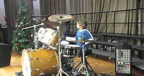 6 yr old drummer Julius Radino plays Don't stop Believing