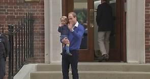 Gorgeous Prince George arrives at hospital and waves to the media