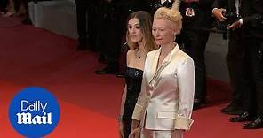 Tilda Swinton holds hands with daughter at Parasite premiere