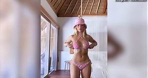 Lottie Moss poses in a pink bikini and hat on new Instagram video
