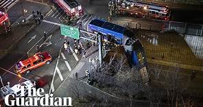 New York bus suspended from expressway after Bronx crash