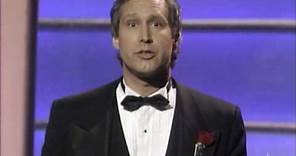 Chevy Chase hosting the 59th Academy Awards®