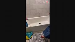 Woman finds her daughter hiding behind shower curtain while sitting on toilet seat
