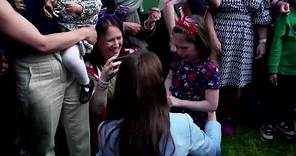 Princess Kate hugs crying girl during walkabout