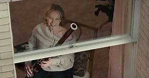 Amy Ryan & Steve Martin at the window with bassoon & concertina. Only Murders in the Building (1x04)