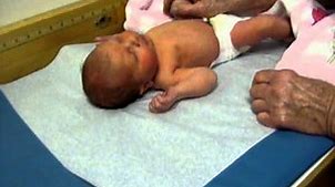 Newborn baby girl at first doctor's appointment