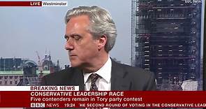 MP Mark Garnier is interrupted by Siri during interview with BBC
