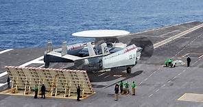 US AWAC Radar Plane Unfolds its Massive Wings Before Carrier Takeoff