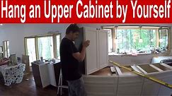 How to install an upper kitchen cabinet by yourself